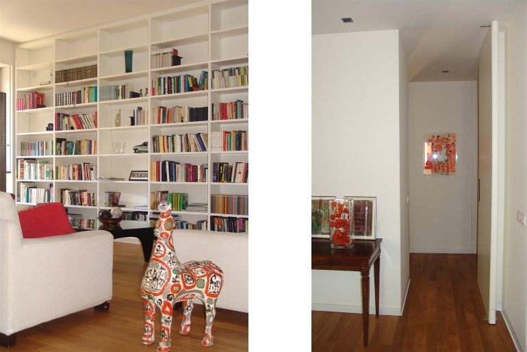 salotto-con-libreria-bianca-scaffali-poltrona